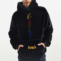 a man wearing a black hoodie with the word rao on it