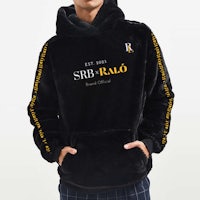 a man wearing a black hoodie that says srb ralo